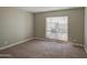 Spacious bedroom with large window and carpet floor at 11616 N 30Th Ln, Phoenix, AZ 85029