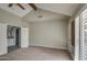 Main bedroom with high ceiling, en-suite bathroom, and window at 11616 N 30Th Ln, Phoenix, AZ 85029