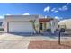 Single-level home with a carport and desert landscaping at 11616 N 30Th Ln, Phoenix, AZ 85029