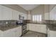 Well-equipped kitchen with granite counters and stylish backsplash at 11616 N 30Th Ln, Phoenix, AZ 85029