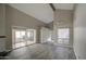 Open living area with sliding glass doors leading to a patio at 11616 N 30Th Ln, Phoenix, AZ 85029