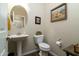 Small bathroom with pedestal sink and toilet at 11971 E Chevelon Trl, Gold Canyon, AZ 85118