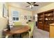 Charming bedroom with small round table and chairs at 11971 E Chevelon Trl, Gold Canyon, AZ 85118