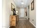 Rustic entryway with wood console table and decor at 11971 E Chevelon Trl, Gold Canyon, AZ 85118