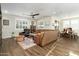 Spacious living room featuring hardwood floors and a cozy seating area at 11971 E Chevelon Trl, Gold Canyon, AZ 85118