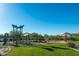 This community playground features a climbing wall and slides at 11971 E Chevelon Trl, Gold Canyon, AZ 85118