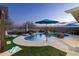 Relaxing kidney shaped pool with a waterfall feature at 11971 E Chevelon Trl, Gold Canyon, AZ 85118