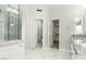 Main bathroom with a double vanity, a large shower, and walk-in closet at 1209 N Newport St, Chandler, AZ 85225