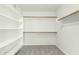 Large walk-in closet with built-in shelves and hanging rods at 1209 N Newport St, Chandler, AZ 85225