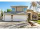 Two-story house with a two-car garage and well-maintained yard at 1209 N Newport St, Chandler, AZ 85225