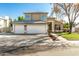 Two-story house with a two-car garage and landscaped yard at 1209 N Newport St, Chandler, AZ 85225