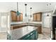 Spacious kitchen with granite countertops and teal island at 1209 N Newport St, Chandler, AZ 85225