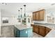 Kitchen with an island and stainless steel appliances at 1209 N Newport St, Chandler, AZ 85225