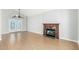 Living room with hardwood floors and a fireplace at 1209 N Newport St, Chandler, AZ 85225