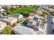 Aerial view of backyard, pool, and community green space at 12378 W Roma Ave, Avondale, AZ 85392