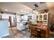 Open kitchen featuring an island with stainless steel appliances at 12378 W Roma Ave, Avondale, AZ 85392