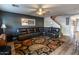 Spacious living room featuring a staircase and modern decor at 12378 W Roma Ave, Avondale, AZ 85392