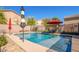 This backyard features a refreshing pool, perfect for outdoor relaxation and enjoyment at 12378 W Roma Ave, Avondale, AZ 85392
