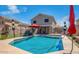 This backyard features a refreshing pool, perfect for outdoor relaxation and enjoyment at 12378 W Roma Ave, Avondale, AZ 85392