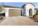 Single-story home with a two-car garage and landscaped front yard at 13360 W Red Hawk Dr, Peoria, AZ 85383