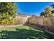 Neat backyard with artificial turf and mature plants at 14206 W Mandalay Ln, Surprise, AZ 85379