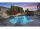 Relax and unwind by the beautiful kidney-shaped pool at 14206 W Mandalay Ln, Surprise, AZ 85379