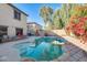 Relaxing pool area with spacious patio and seating at 14206 W Mandalay Ln, Surprise, AZ 85379