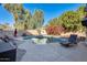 Inviting kidney-shaped pool with waterfall feature at 14206 W Mandalay Ln, Surprise, AZ 85379