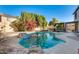 Inviting pool with a rock waterfall feature at 14206 W Mandalay Ln, Surprise, AZ 85379