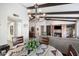 Dining area with table and chairs, view of living room and fireplace at 1498 Leisure World --, Mesa, AZ 85206