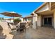 Covered patio with seating area, umbrella, and tile flooring at 1498 Leisure World --, Mesa, AZ 85206