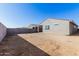 Spacious backyard with a view of neighboring homes at 1523 S 223Rd Dr, Buckeye, AZ 85326