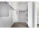 Spacious closet with shelves and hanging rod at 1523 S 223Rd Dr, Buckeye, AZ 85326