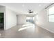 Bright living room with tile floors and sliding glass doors at 1523 S 223Rd Dr, Buckeye, AZ 85326