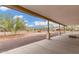 Covered back patio with stunning views of the natural landscape at 1628 E Magellan Dr, New River, AZ 85087