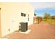 Home's exterior featuring an AC unit and a fenced yard at 1628 E Magellan Dr, New River, AZ 85087