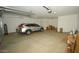 Spacious two-car garage with ample storage space at 1628 E Magellan Dr, New River, AZ 85087