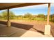 Covered patio overlooking the backyard at 1628 E Magellan Dr, New River, AZ 85087