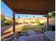 Covered patio overlooking a grassy backyard at 16602 W Tasha Dr, Surprise, AZ 85388