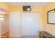 Bright bedroom with double doors and mirrored closet at 16616 E Palisades Blvd # 201, Fountain Hills, AZ 85268