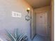 Building exterior, showing another entrance with screen door at 16616 E Palisades Blvd # 201, Fountain Hills, AZ 85268