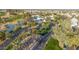 Aerial view of gated community entrance with palm trees at 17200 W Bell Rd # 517, Surprise, AZ 85374