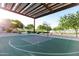 Covered outdoor basketball court with scenic views at 18114 W Desert Sage Dr, Goodyear, AZ 85338