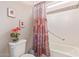 Bathroom with tub, shower, and updated fixtures at 18114 W Desert Sage Dr, Goodyear, AZ 85338