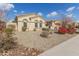 One-story home with desert landscaping and driveway at 18114 W Desert Sage Dr, Goodyear, AZ 85338