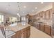 Spacious kitchen with granite countertops and custom cabinetry at 18114 W Desert Sage Dr, Goodyear, AZ 85338