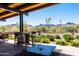 Community center patio with mountain views at 18114 W Desert Sage Dr, Goodyear, AZ 85338