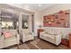 Light-filled sitting room with comfortable seating at 18114 W Desert Sage Dr, Goodyear, AZ 85338