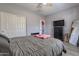 Bedroom with a queen bed, large closet and dresser at 1866 N 214Th Ln, Buckeye, AZ 85396