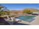 Enjoy mountain views from this relaxing poolside retreat at 1866 N 214Th Ln, Buckeye, AZ 85396